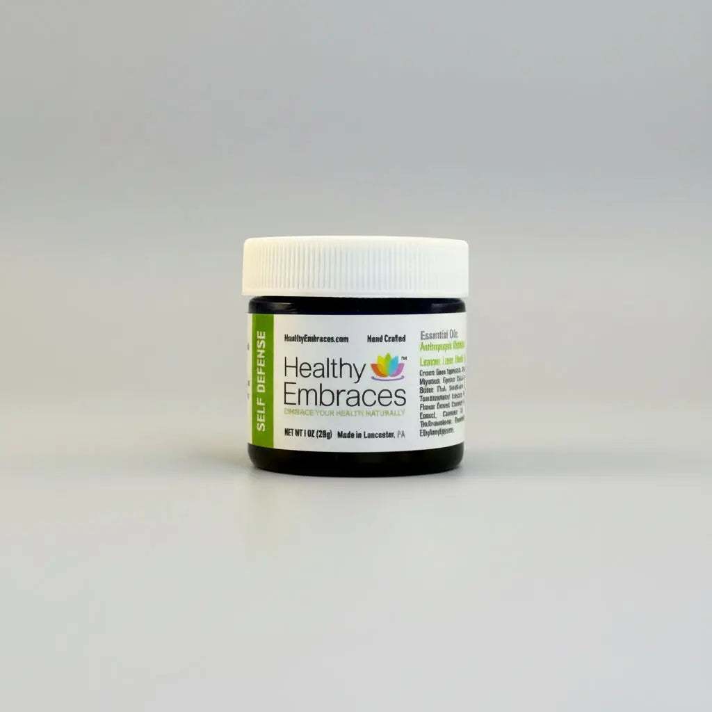 Healthy Embraces 4oz self-defense cream in a white jar with a label, designed for personal safety and protection.