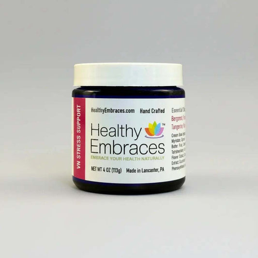 Healthy Embraces Vagus Nerve Stress Support Cream in a 4oz jar, showing the creamy texture and label on the product.