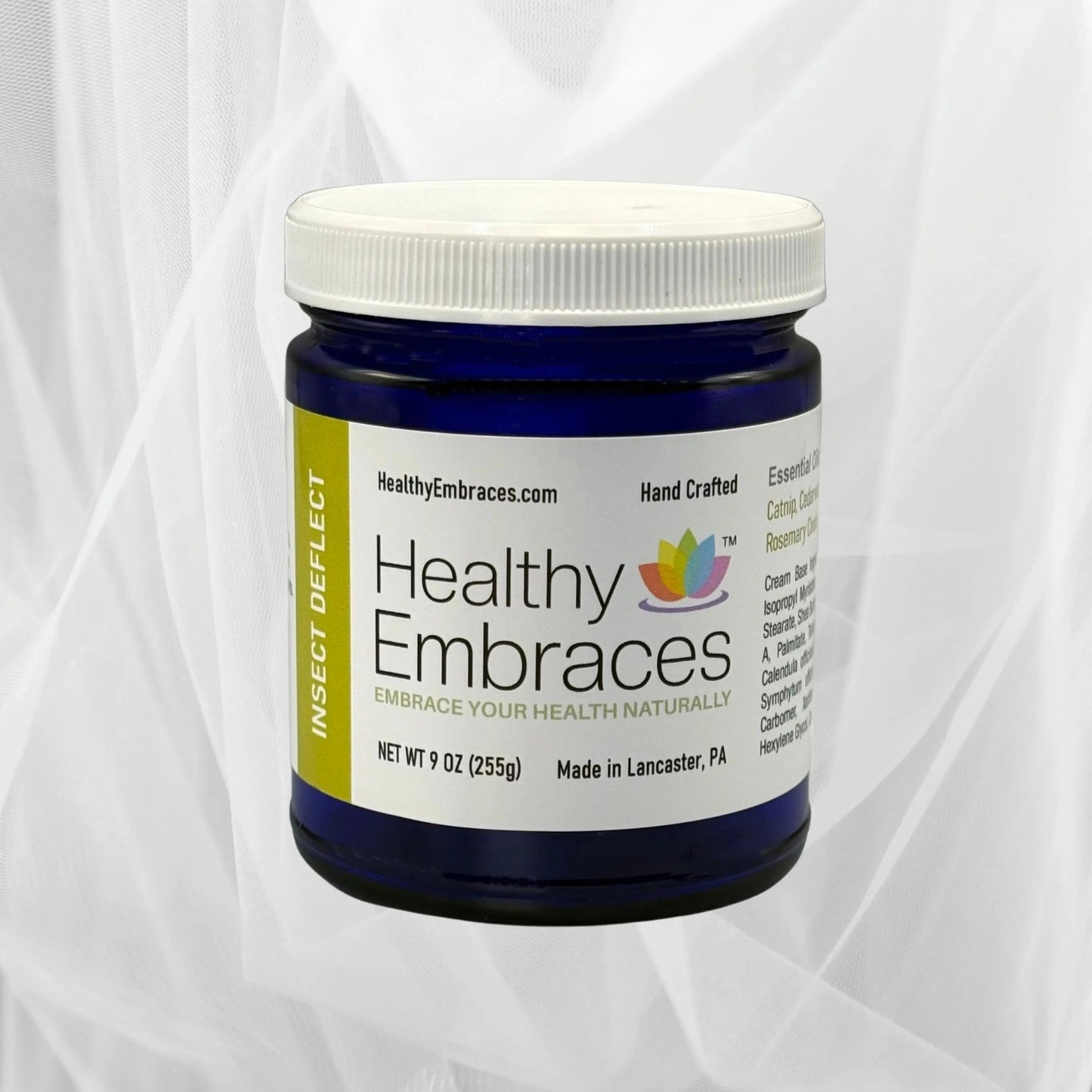 Healthy Embraces Insect Deflect Cream jar showing the creamy texture of the insect repellent cream.