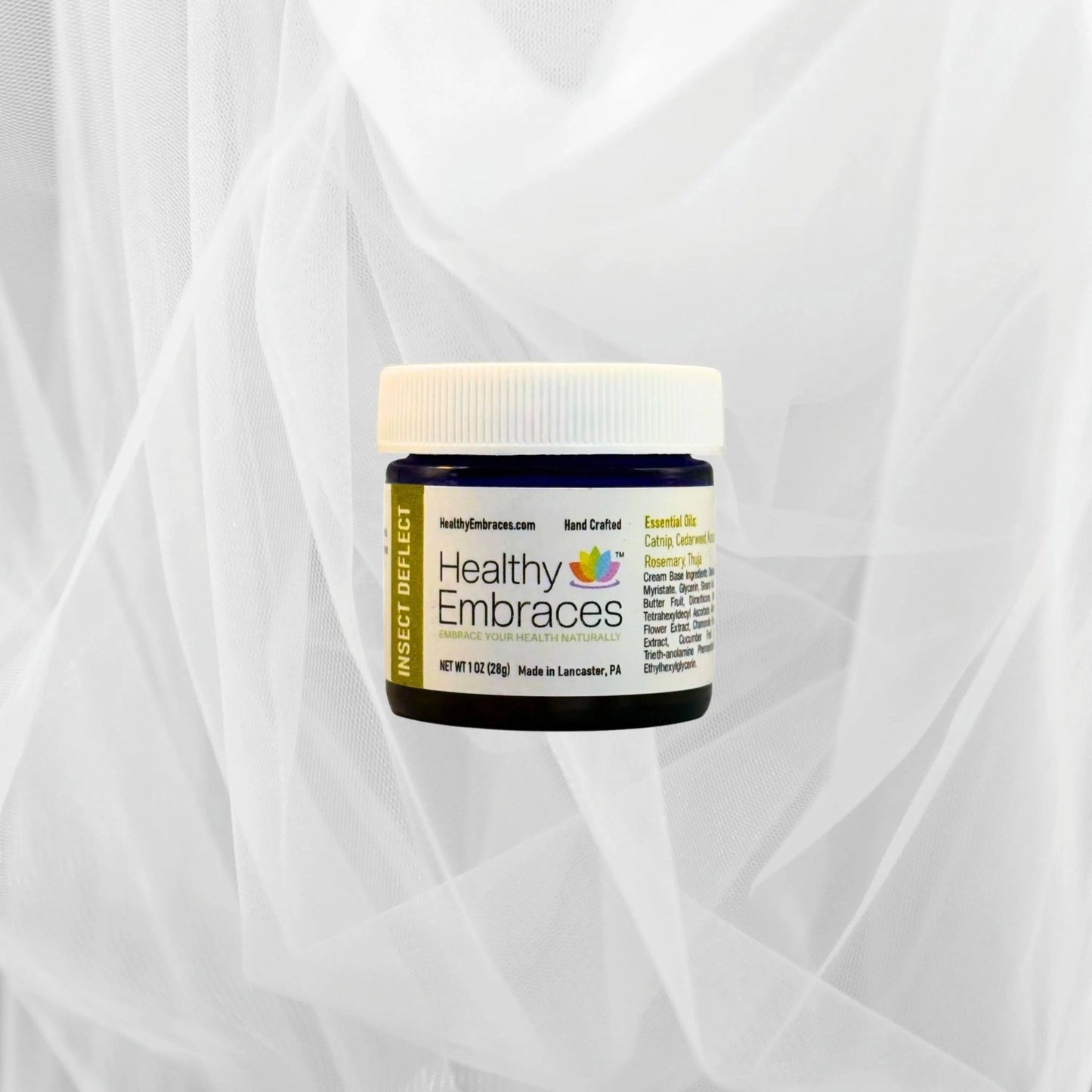 Healthy Embraces Insect Deflect Cream in a jar, showcasing the soothing skincare product with a clean, minimal design.